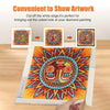 A close-up of a finished diamond painting artwork on canvas, surrounded by magnetic frames and instructions.