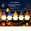 A string of ten decorative ghost night lights with colorful shades hangs against a dark outdoor background.