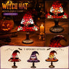 A collection of three spooky style witch hat night lights featuring stained glass effects on a table lamp base.