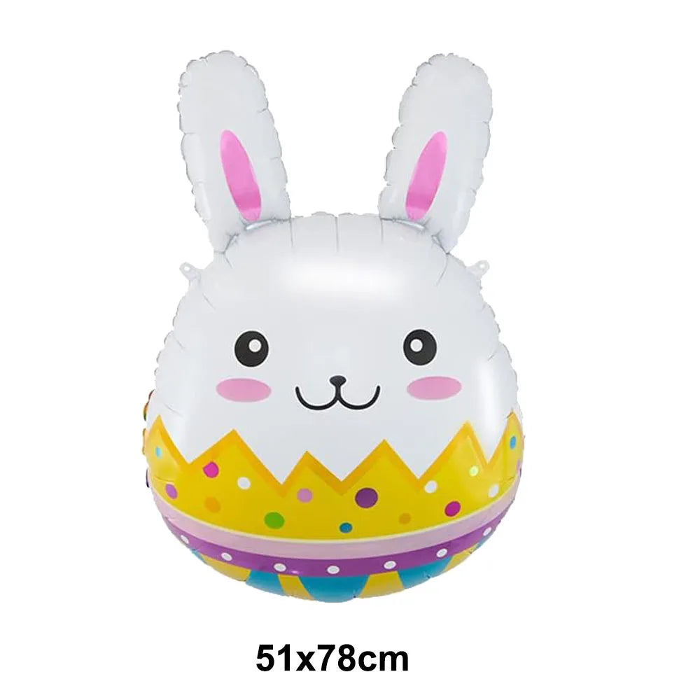A white foil balloon shaped like a cartoon bunny with pink inner ears and a yellow patterned belly.