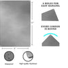 Señal de metal de aluminio plateado rectangular con cuatro orificios para colgar y esquinas redondeadas.