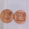Two rose gold challenge coins featuring gothic designs, including a Grim Reaper and skull motif.