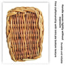 Handwoven rattan storage basket with intricate bottom texture and handles
