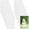 A set of magnetic picture frames in various sizes and orientations, with one frame showing a child outdoors.