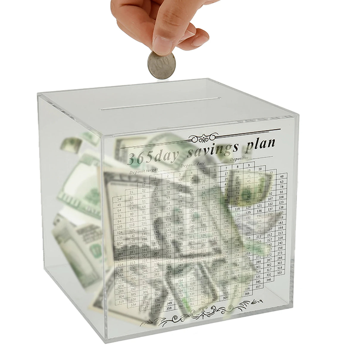 A hand is dropping a coin into a clear acrylic savings box labeled 365day savings plan.
