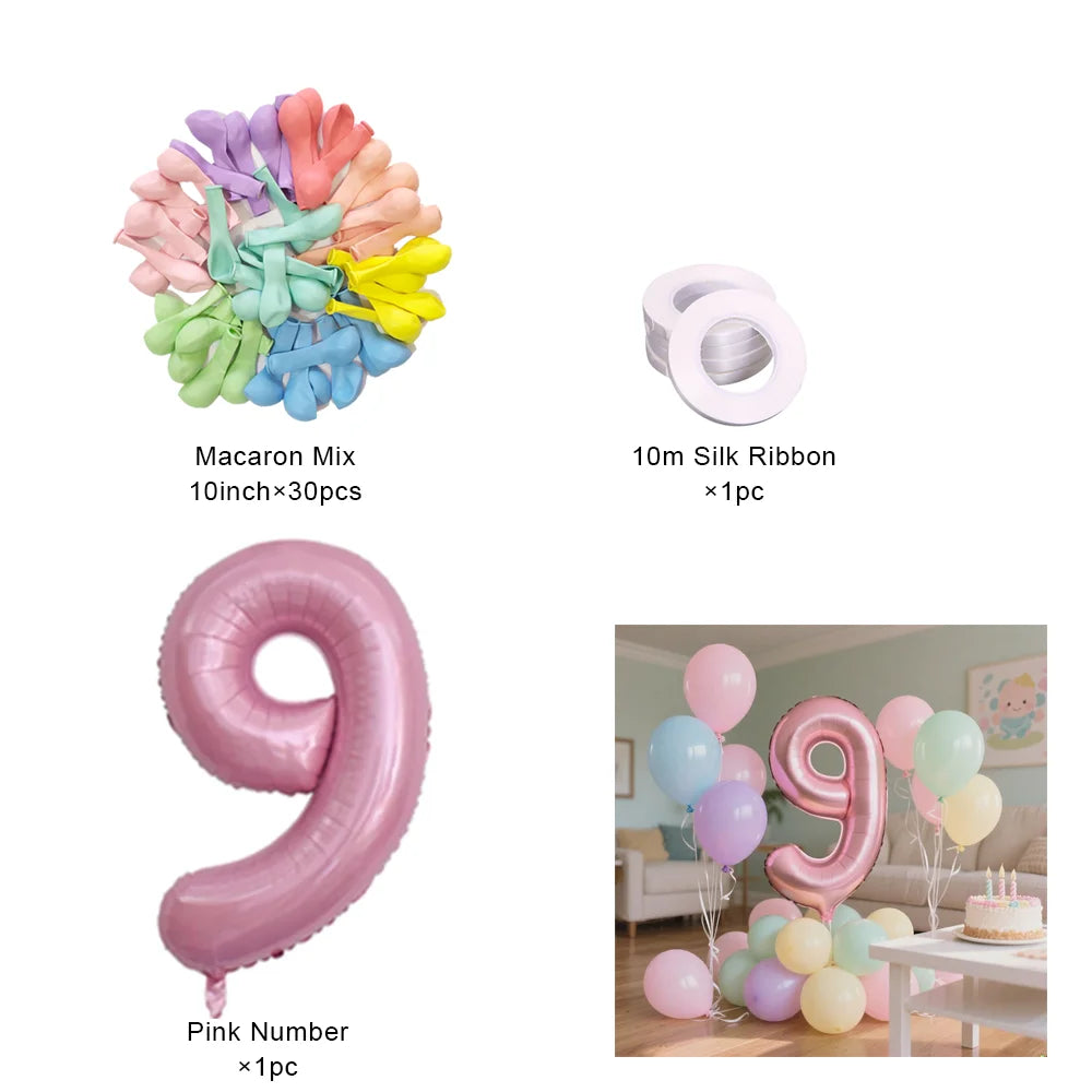 Un ensemble de ballons en papier d'aluminium roses en forme du chiffre 9, incluant un grand ballon et des accents plus petits