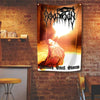 A black metal style flag tapestry wall hanging featuring a figure engulfed in bright light against an orange background.