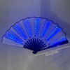 A glowing blue folding LED fan with light rays, displayed against a white background.