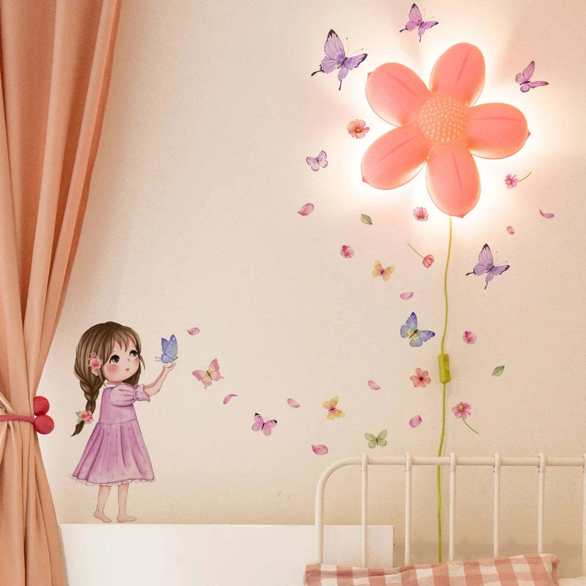 A young girl is interacting with butterfly wall stickers on a wall decorated with pink and purple flowers.