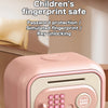 A pink electronic piggy bank with a fingerprint sensor and key unlocking feature for children.