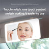 A car sun visor vanity mirror with an LED light showing a woman's face.
