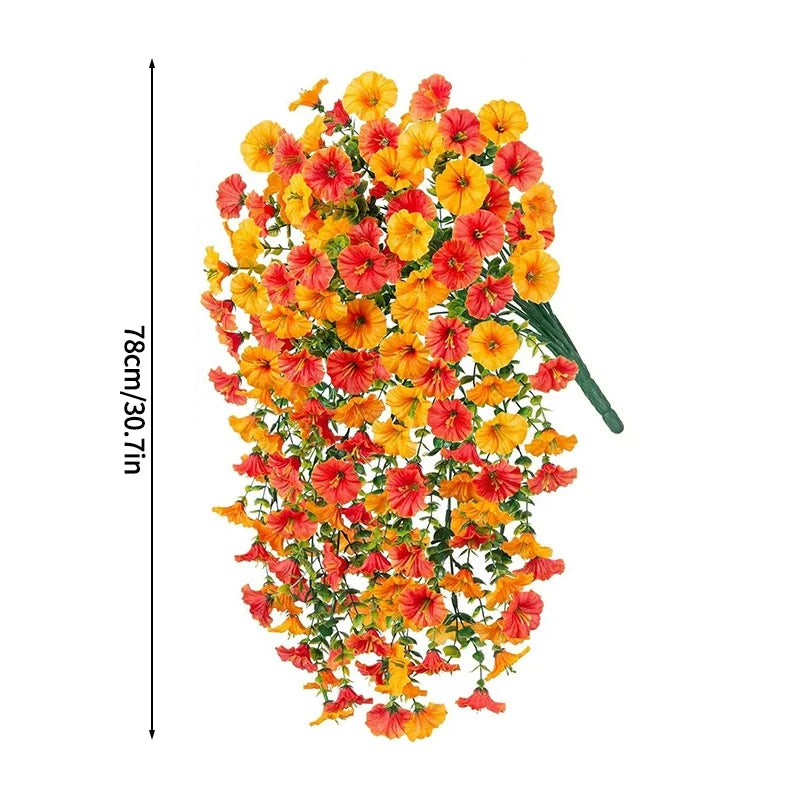A vertical arrangement of vibrant orange and yellow silk morning glory vine hanging flowers for home decor.