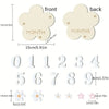 Set of wooden monthly milestone cards showing the words MONTH and MONTHS and numbers 0 through 9