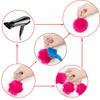 A set of faux fur pom poms in various shades of pink and magenta, shown alongside a silver keychain tool.