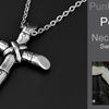 Silver stainless steel cross pendant necklace with a chain displayed against a dark background.