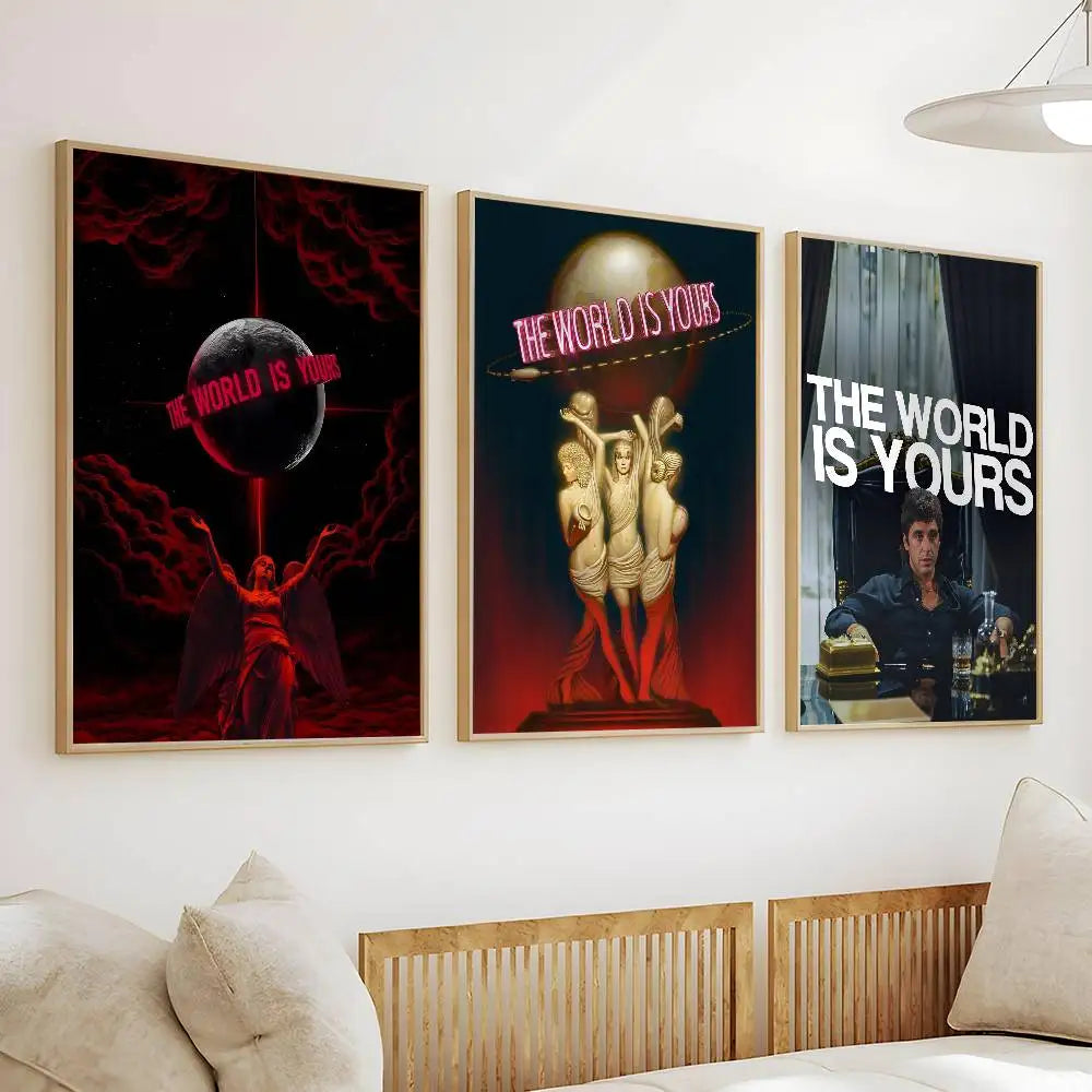 A gallery wall featuring three framed posters with intense red and black imagery related to the theme The World Is Yours.