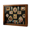 A wooden photo display frame featuring multiple framed photographs with ornate gold borders and glass.