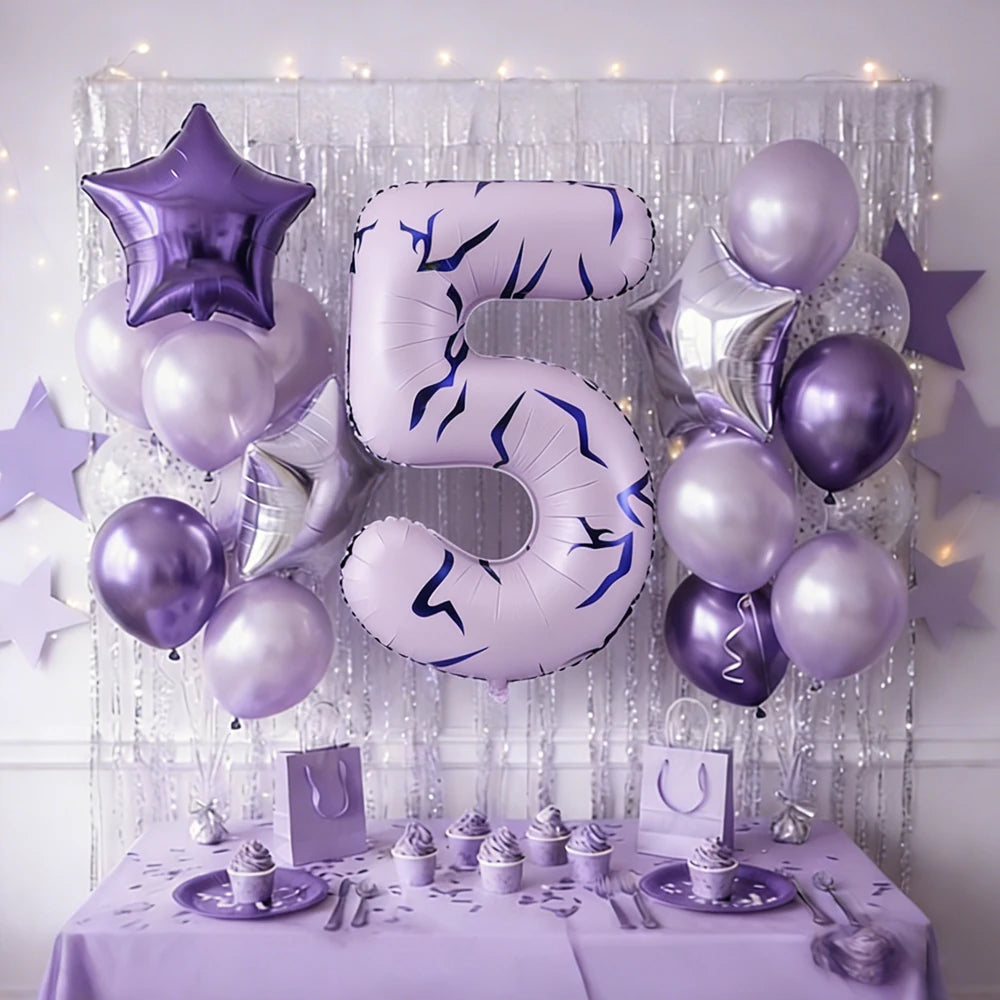 Silver and purple balloons forming the number 5 decorated for a birthday or themed event