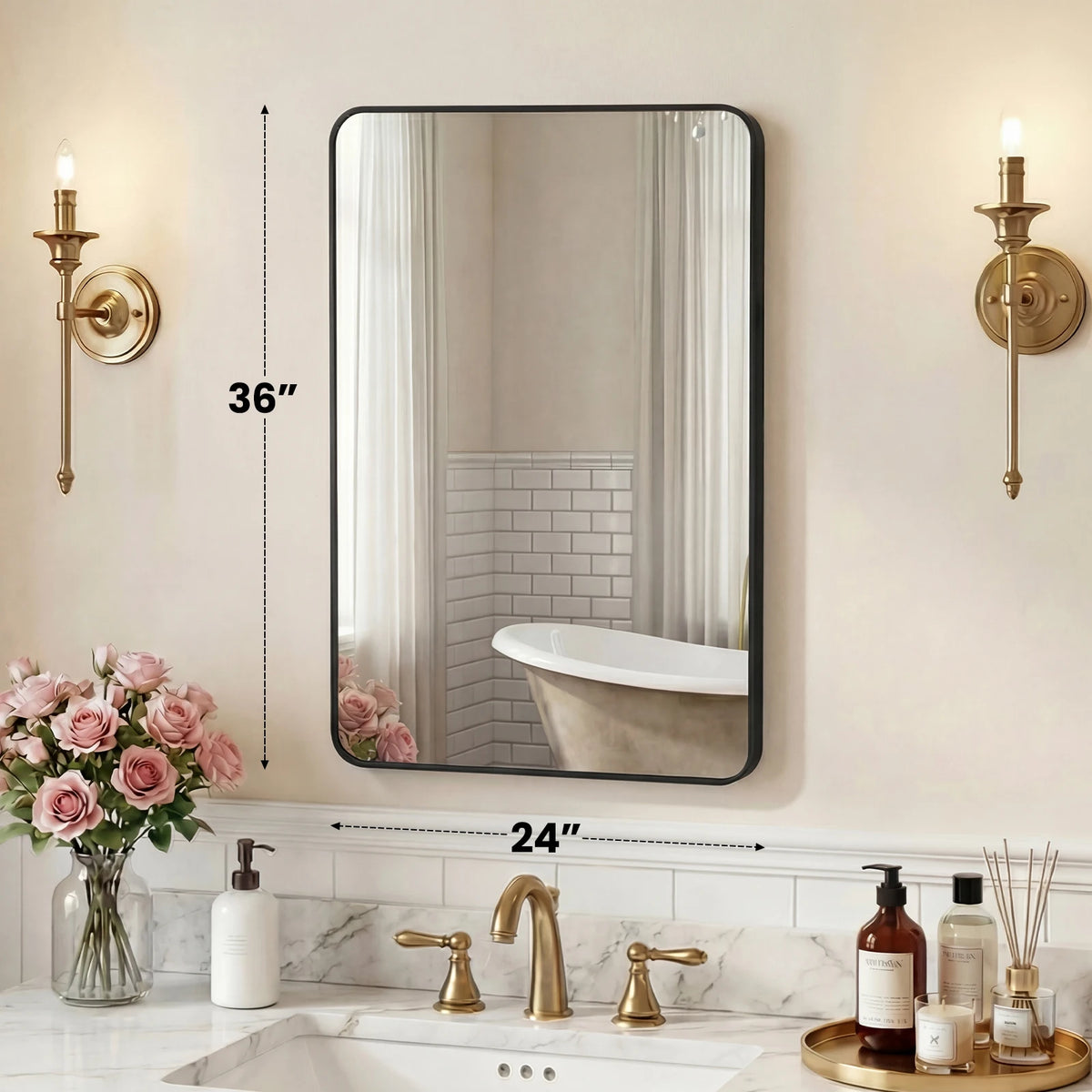 A modern bathroom featuring a large rectangular mirror above a white tub and vanity area with gold fixtures.