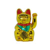 A golden electric waving lucky cat figurine with red ears and a green collar.