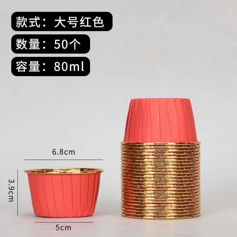 A stack of 50 golden greaseproof cupcake liners in a coral pink color, with dimensions shown.