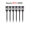 Six black square solar pathway lights with illuminated bulbs.