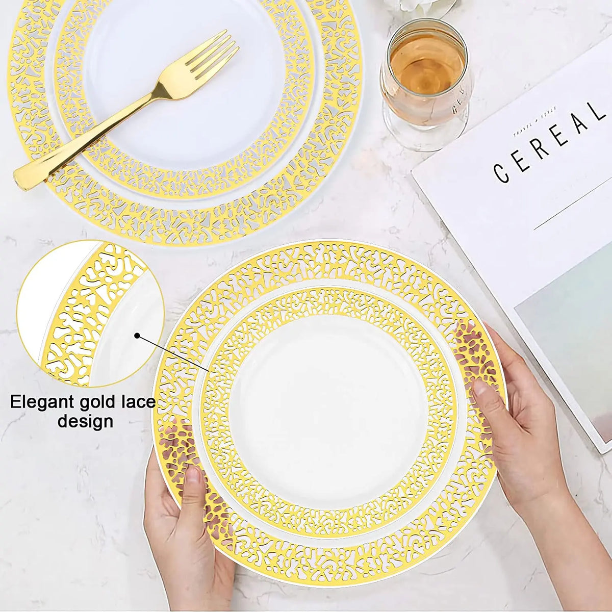 A set of elegant gold rim plastic dinner and dessert plates with a decorative lace design on a white background.
