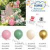 A collection of pink, white, and gold balloons arranged in a garland display with various sizes and a balloon chain.