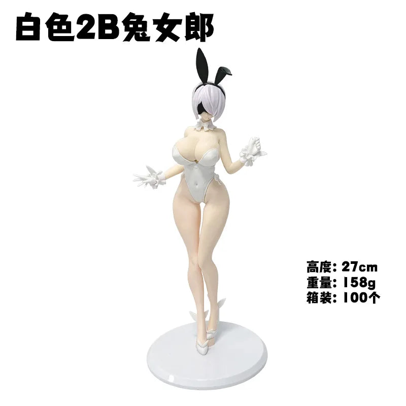 A white 2B female collectible figure with black hair and white outfit.