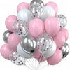 A cluster of pink and silver confetti balloons floating together.