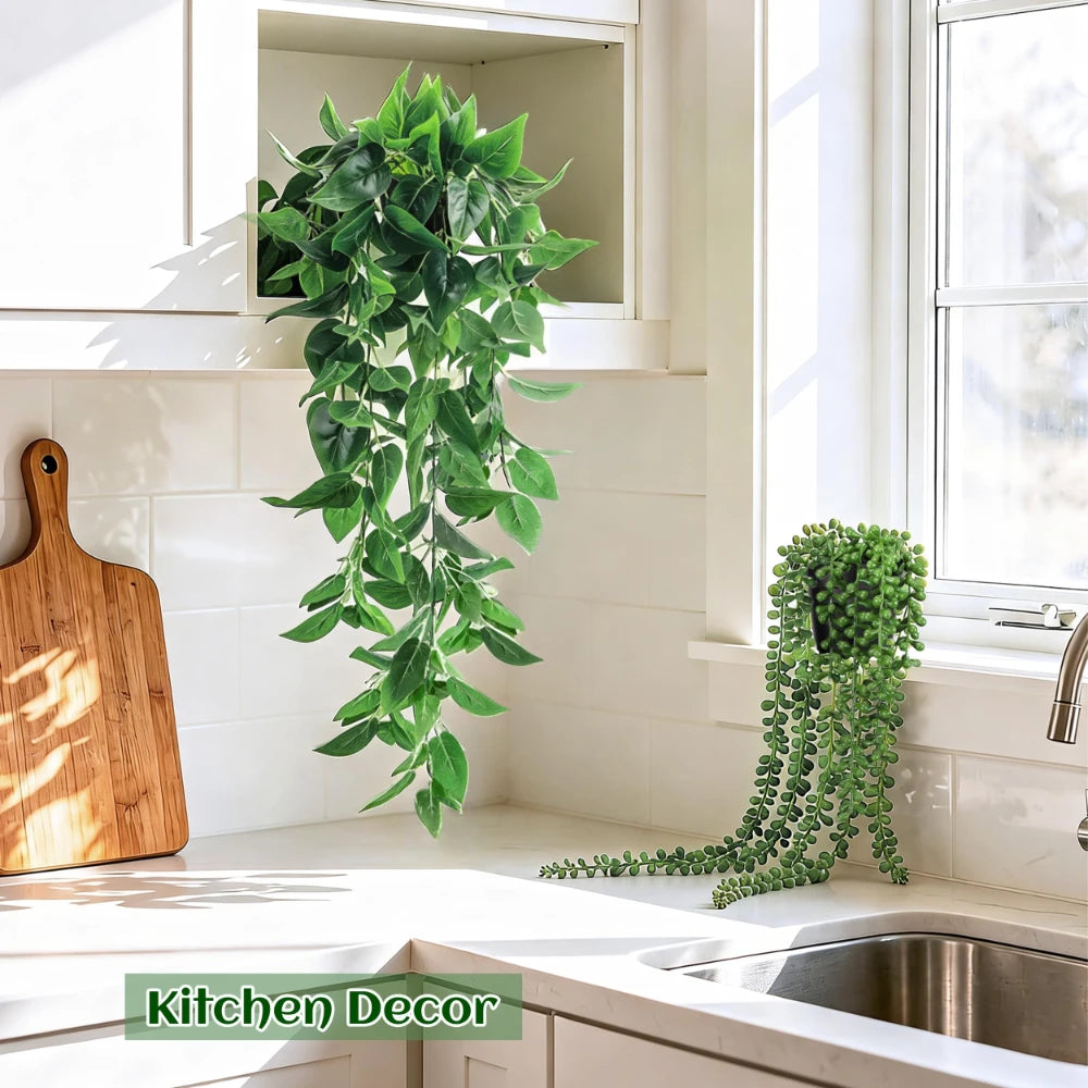 A set of four realistic hanging artificial ivy vines used for kitchen decor and indoor/outdoor foliage display.