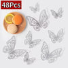 48 pieces of decorative 3D butterfly wall stickers for home decor shown with a slice of orange and lemon.