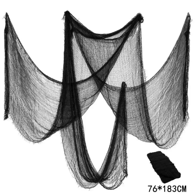 Black Halloween gauze netting or creepy cloth used for spooky party décor