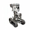 A silver mechanical piston skull sculpture with a metal track base.