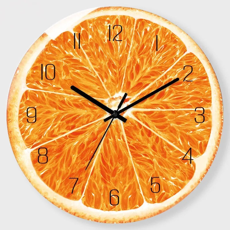 A cross-section of an orange fruit used as the face of a clock with black hands.
