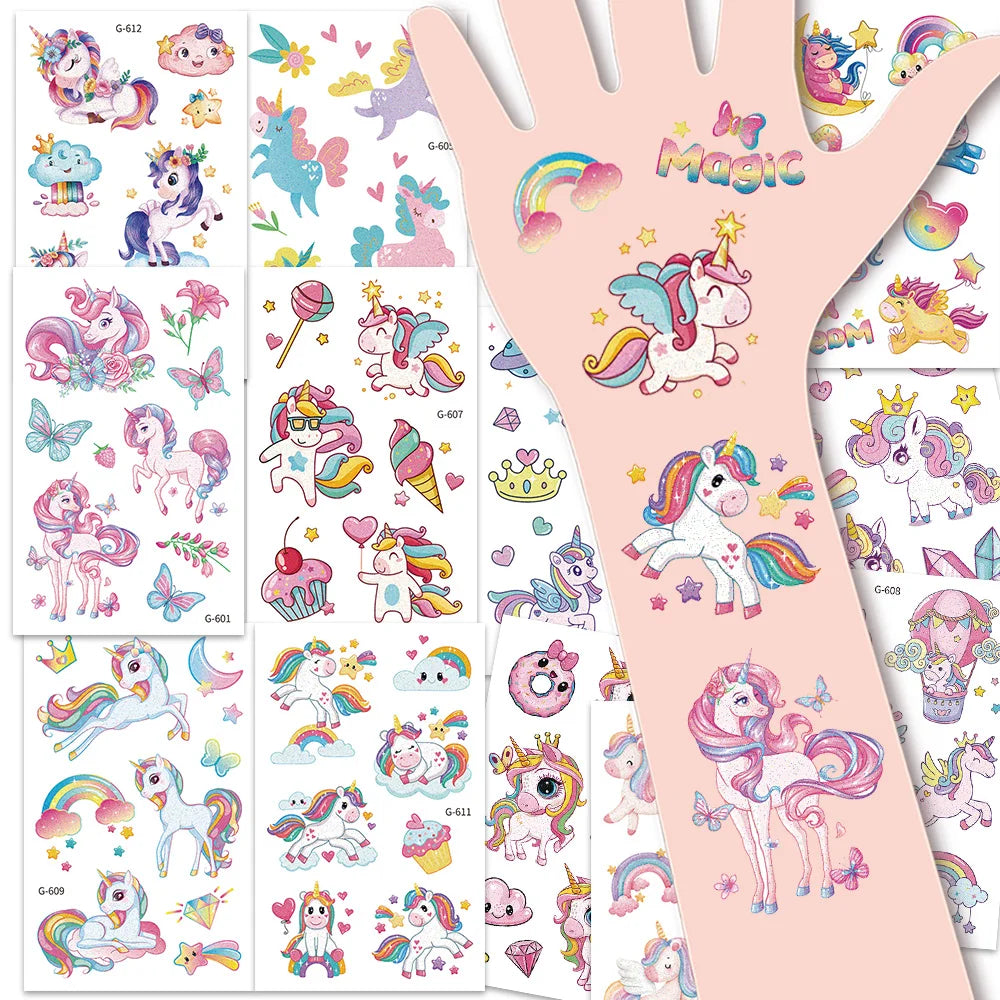 A collection of glitter unicorn temporary tattoos for kids on white sheets.