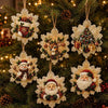 Christmas diamond painting ornaments featuring Santa, a snowman, and a reindeer hanging on a green pine branch