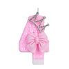 Pink birthday candle with a crown and bow design for cake topper