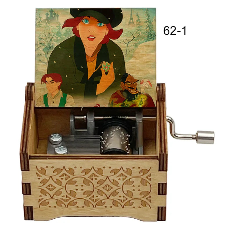 A hand-cranked wooden music box featuring an illustration of characters from Once Upon a December.