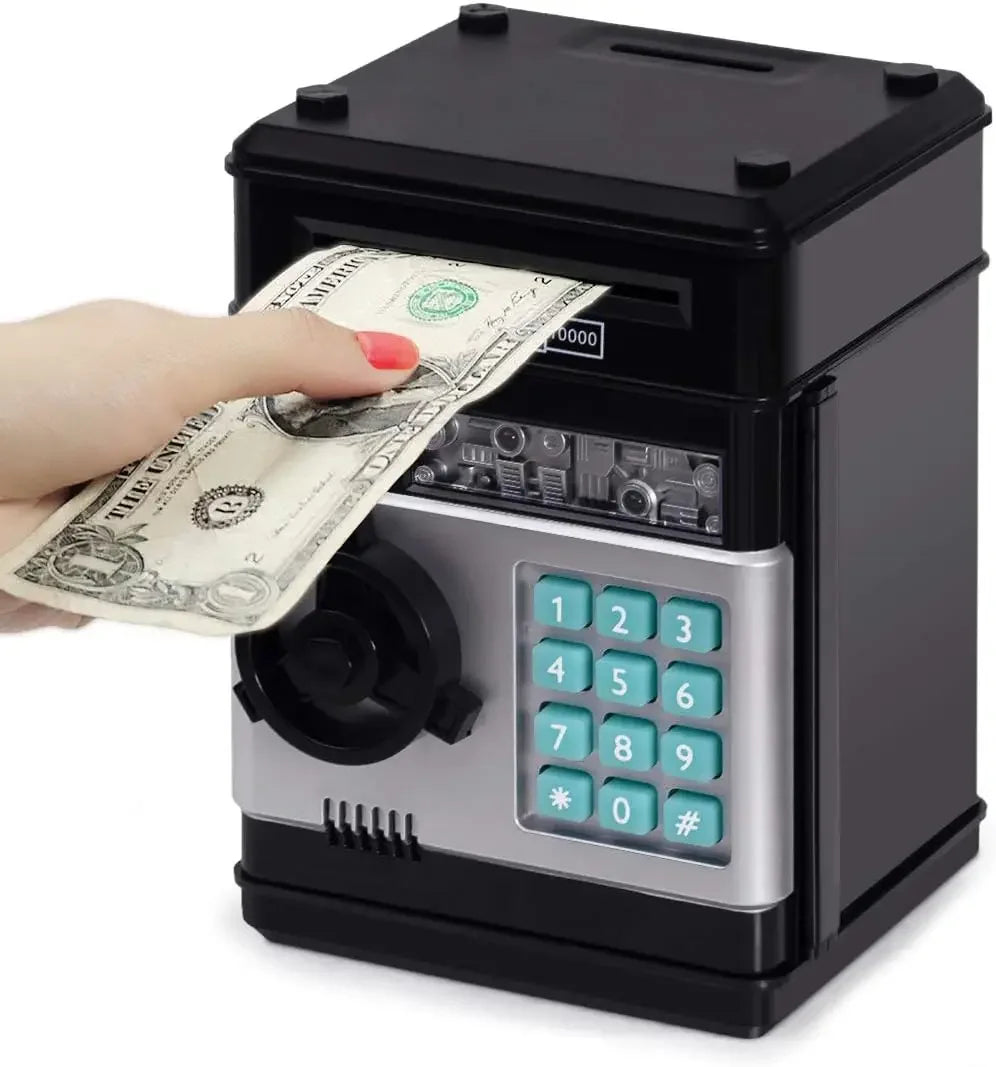 A hand is inserting a stack of US dollar bills into a black combination lock piggy bank.