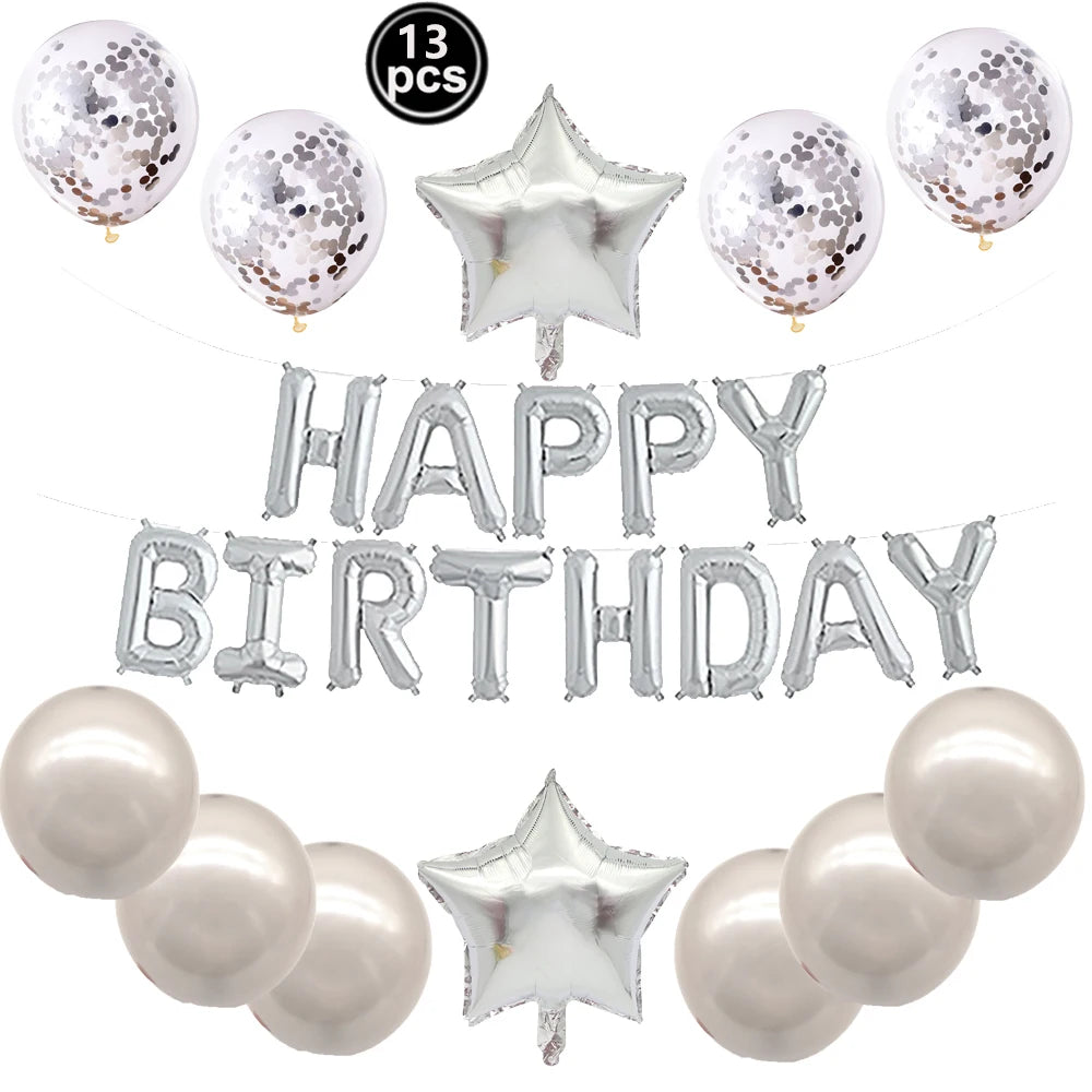 A set of silver and white foil letter balloons and star shaped balloons for a birthday party decoration