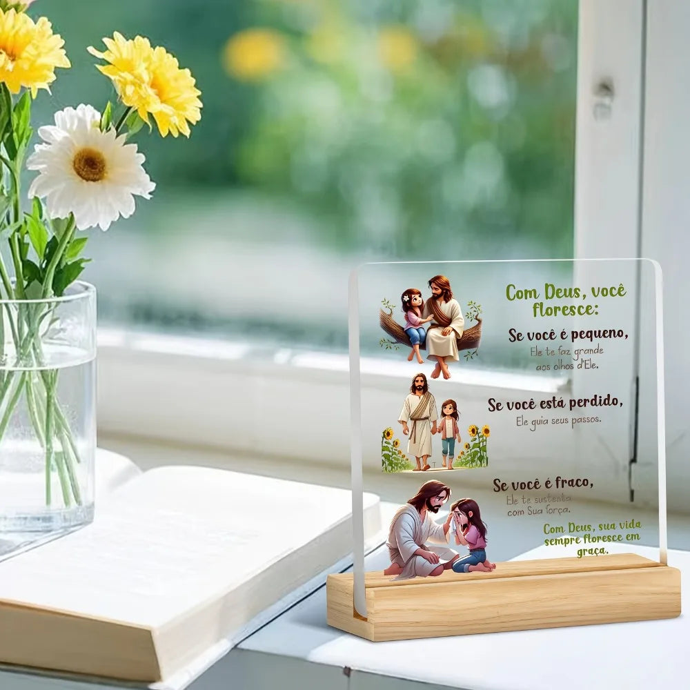 A clear acrylic desktop statue depicting a praying couple with flowers and text about faith.