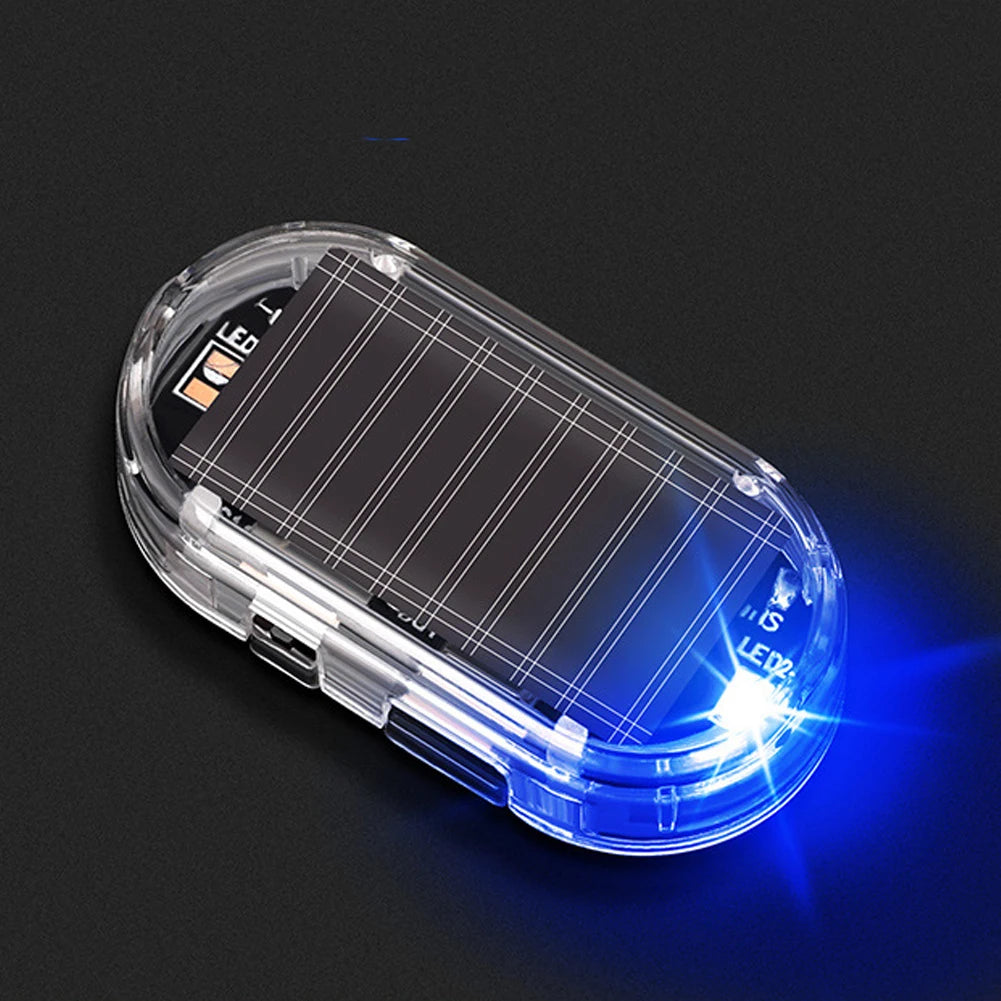 A clear plastic device with internal components and a blue LED light is shown against a dark background.