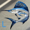 A stylized blue and silver metal fish silhouette wall art against a neutral background.