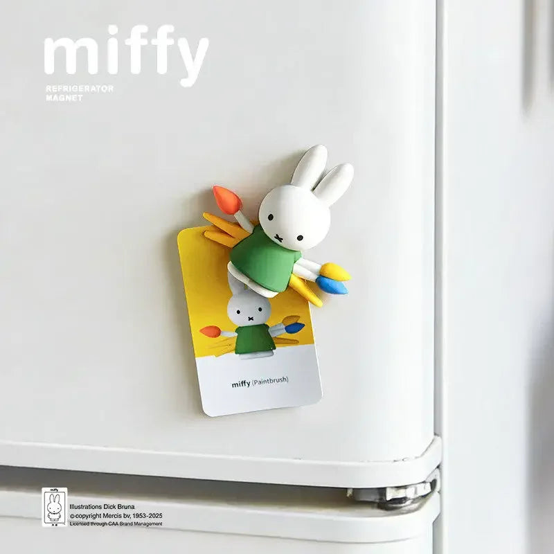 A white refrigerator magnet featuring a cute Miffy character in green and yellow.