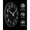 A black round wall clock with gold accents showing the time, featuring environmental protection and accurate time features.