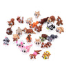 A collection of various articulated 3D animal figurines in brown, orange, and gray colors for desk decor.