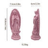 A pink resin statue of Our Lady of Guadalupe with a halo and draped robes.