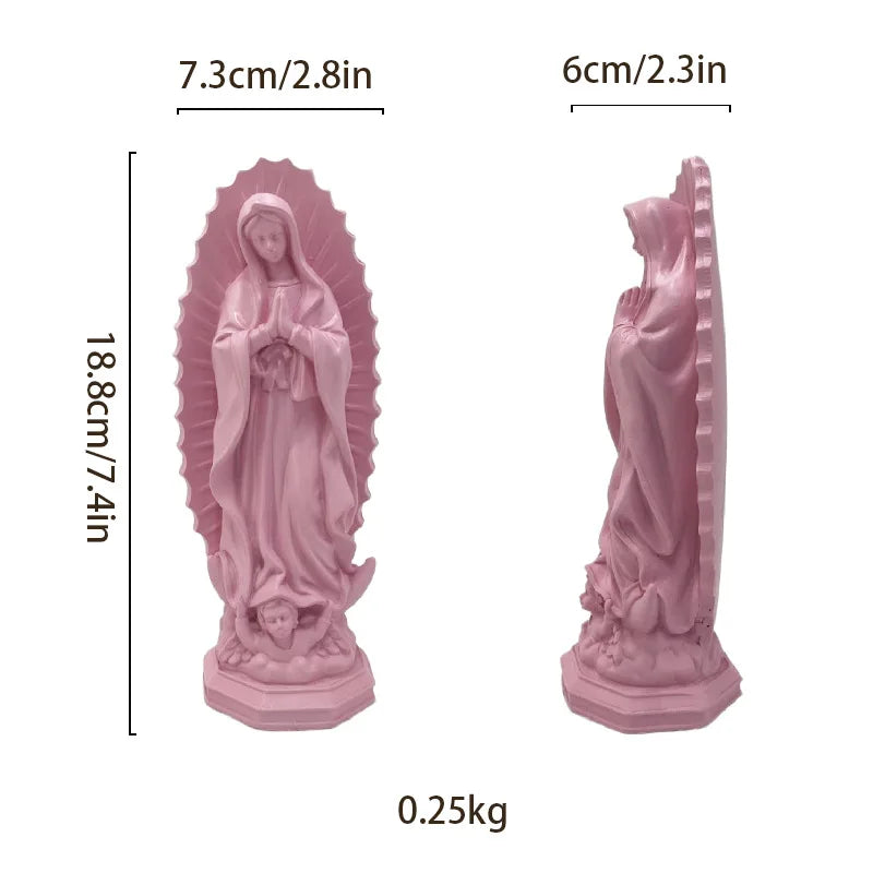 A pink resin statue of Our Lady of Guadalupe with a halo and draped robes.