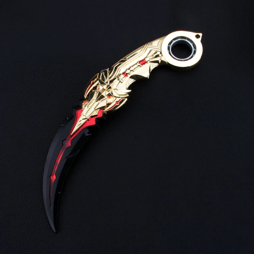 A gold and red anime-style rotating claw knife model with a black blade and a circular opening.